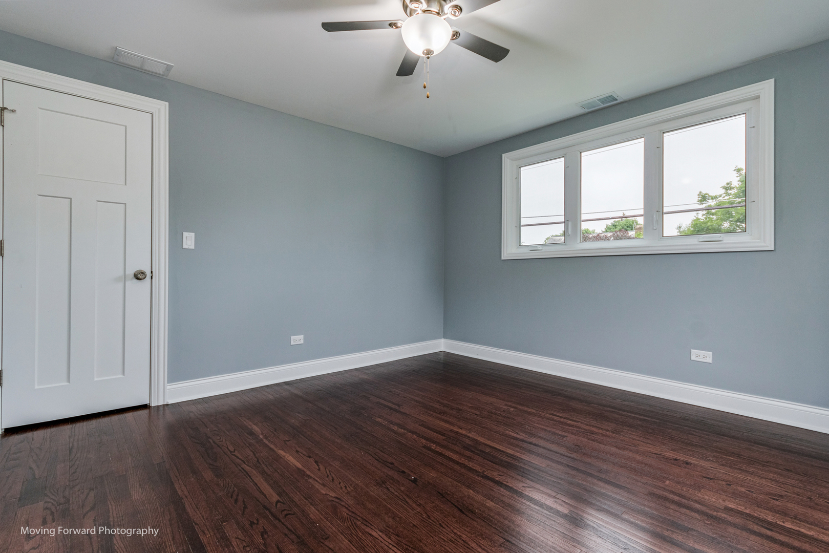 473 East Elm Street Sycamore, IL 60178 - Photo 20 of 53 a view of an empty room with wooden floor and a window