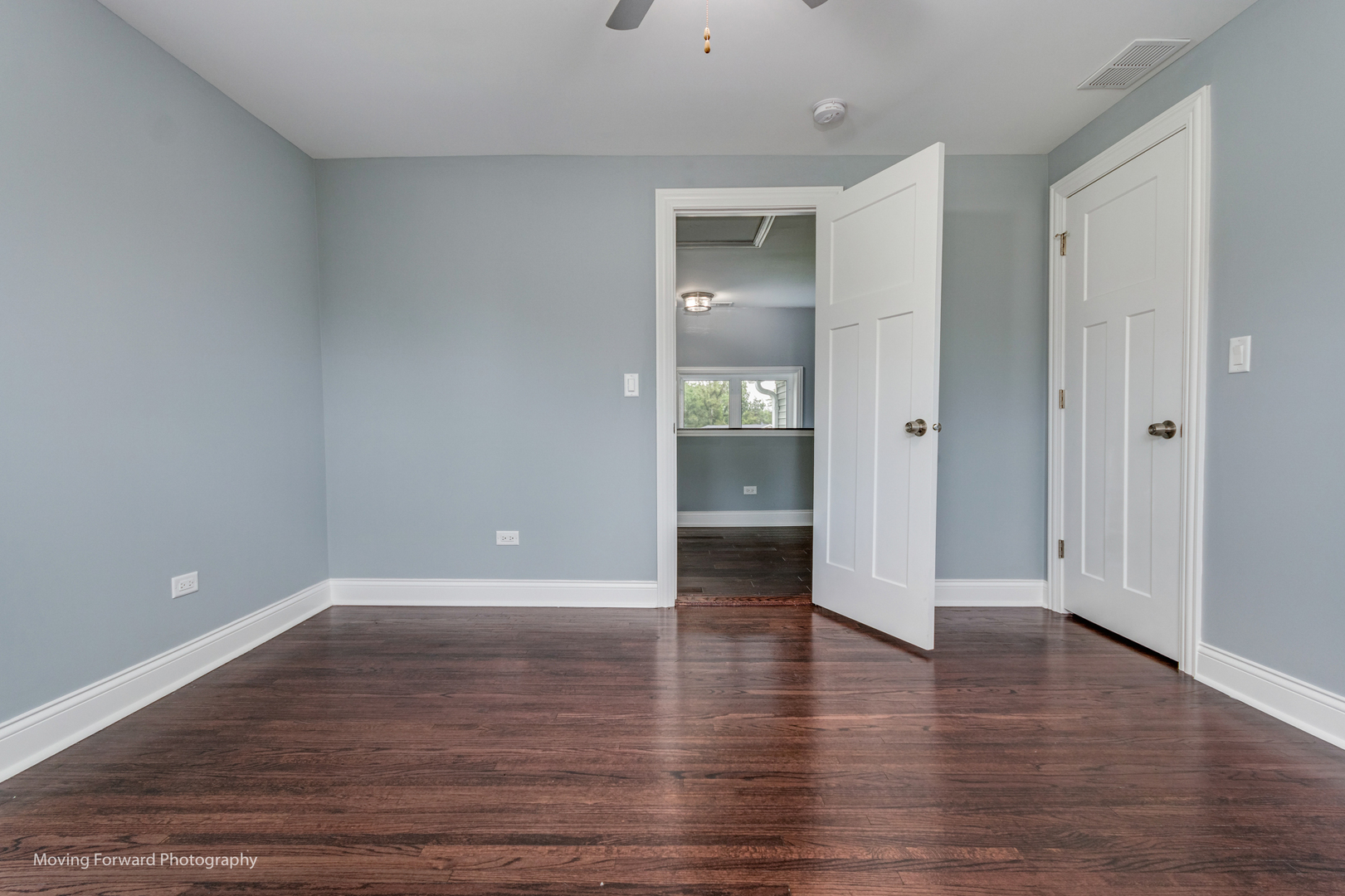 473 East Elm Street Sycamore, IL 60178 - Photo 21 of 53 an empty room with wooden floor and mirror
