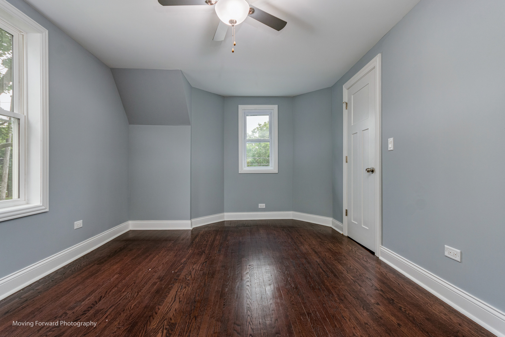 473 East Elm Street Sycamore, IL 60178 - Photo 22 of 53 an empty room with wooden floor and windows