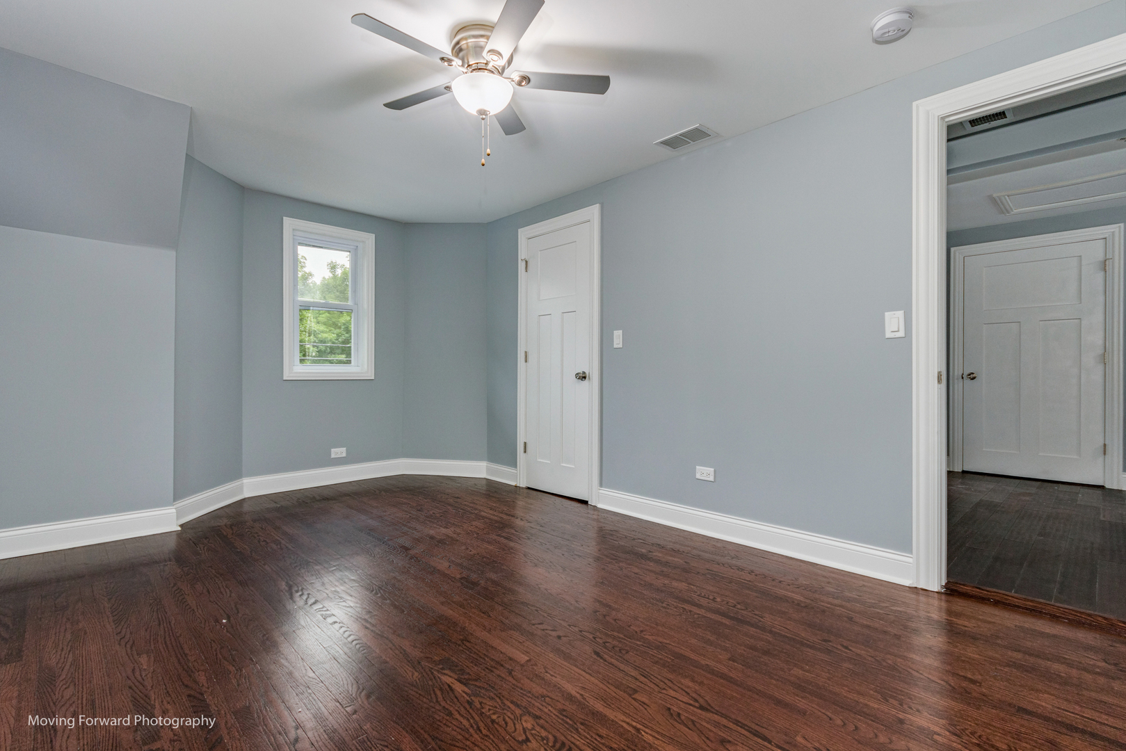 473 East Elm Street Sycamore, IL 60178 - Photo 23 of 53 an empty room with wooden floor and windows