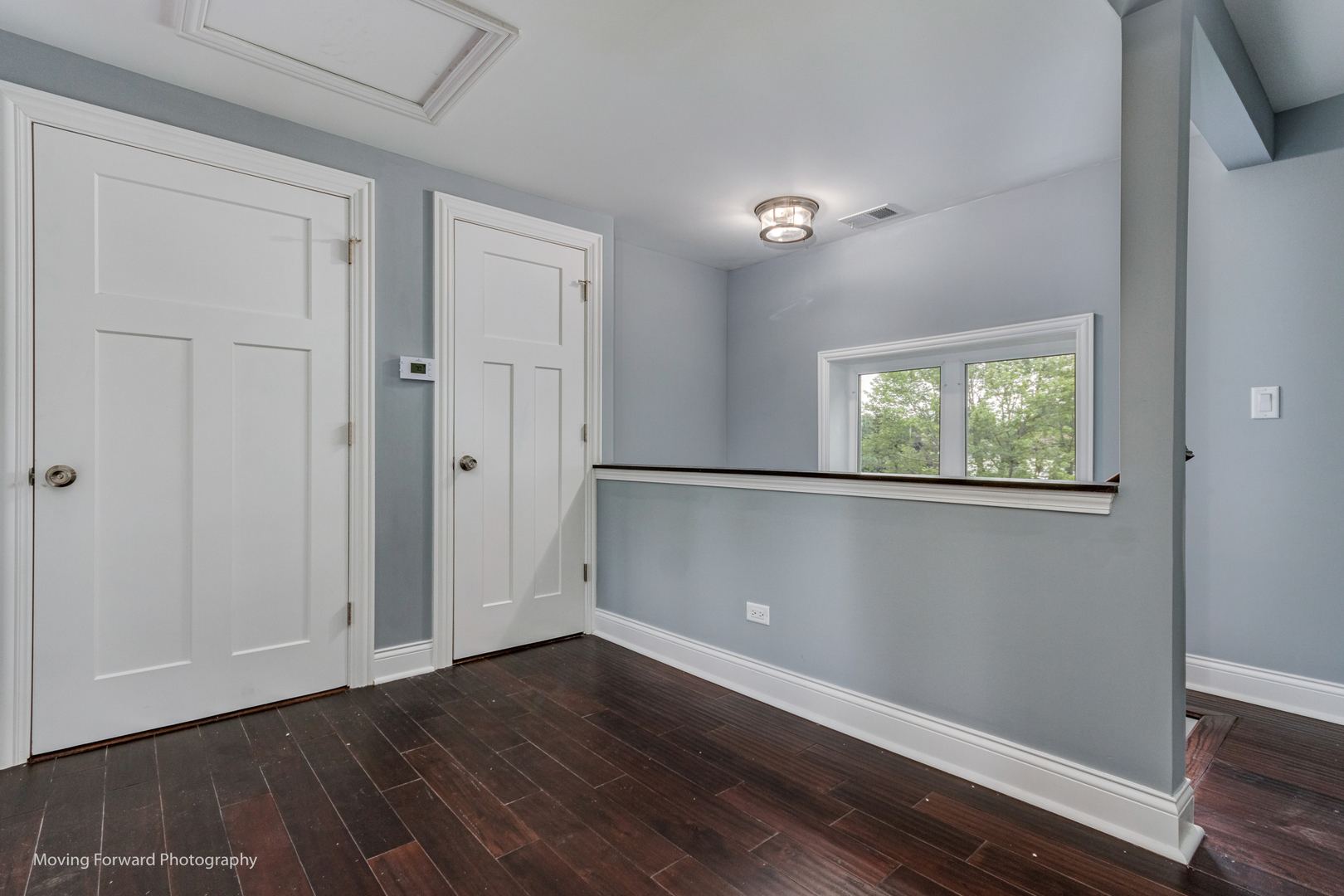 473 East Elm Street Sycamore, IL 60178 - Photo 24 of 53 an empty room with wooden floor closet and windows