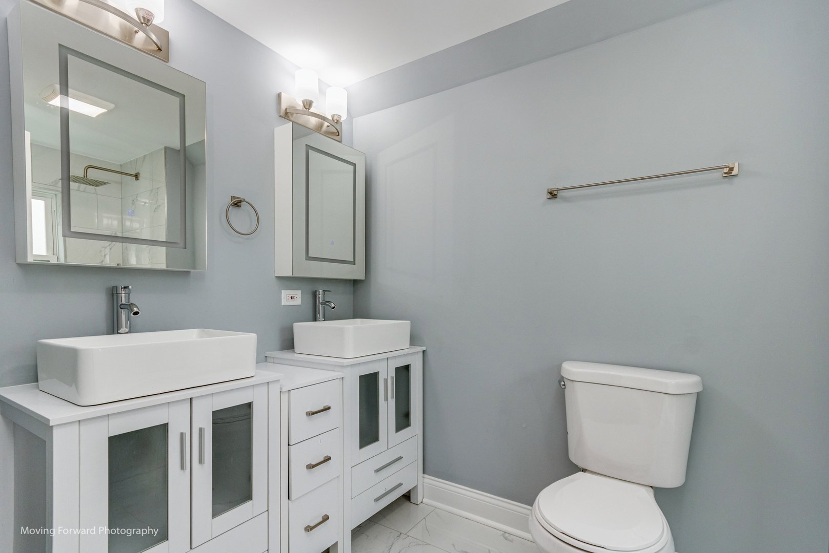 473 East Elm Street Sycamore, IL 60178 - Photo 28 of 53 a bathroom with a toilet sink and mirror