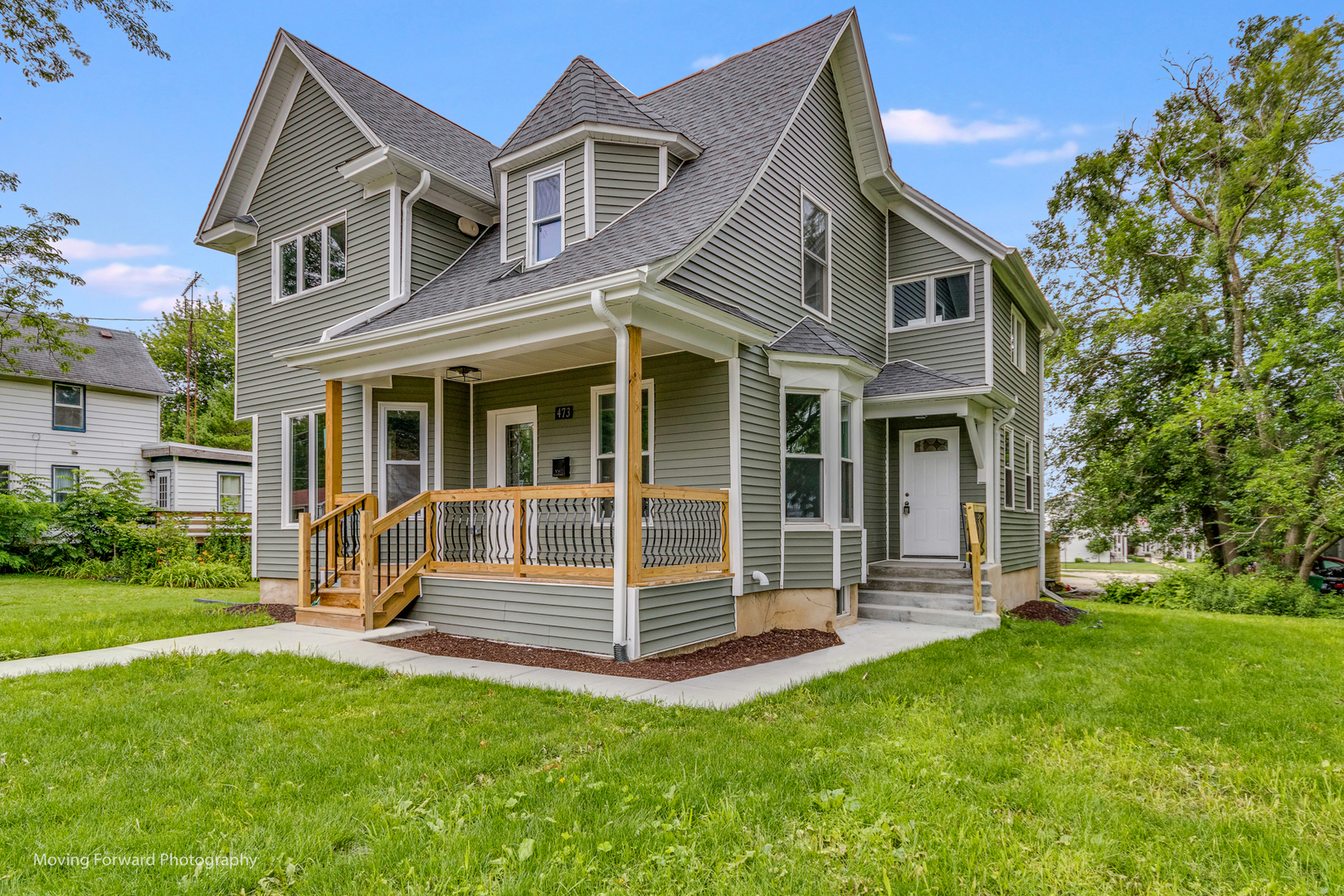 473 East Elm Street Sycamore, IL 60178 - Photo 3 of 53 a view of a house with a yard