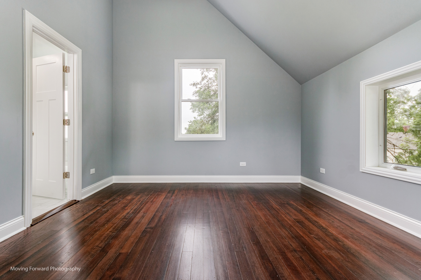 473 East Elm Street Sycamore, IL 60178 - Photo 31 of 53 an empty room with wooden floor and windows