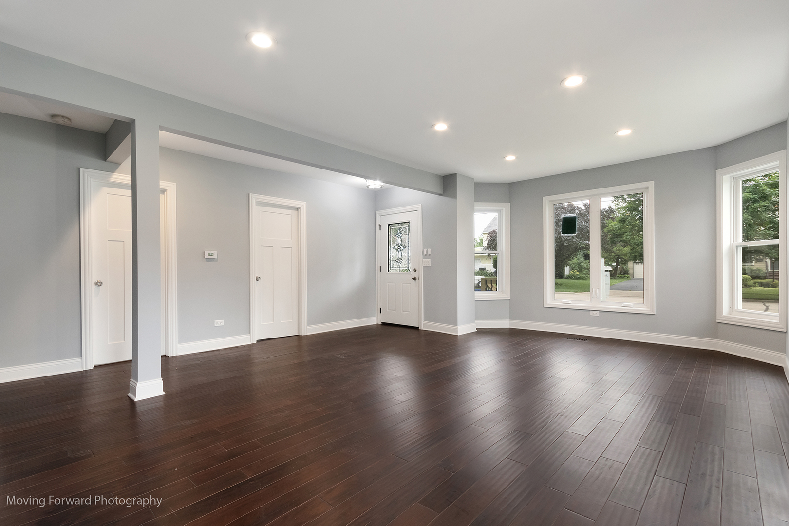 473 East Elm Street Sycamore, IL 60178 - Photo 34 of 53 a view of an empty room with wooden floor and windows