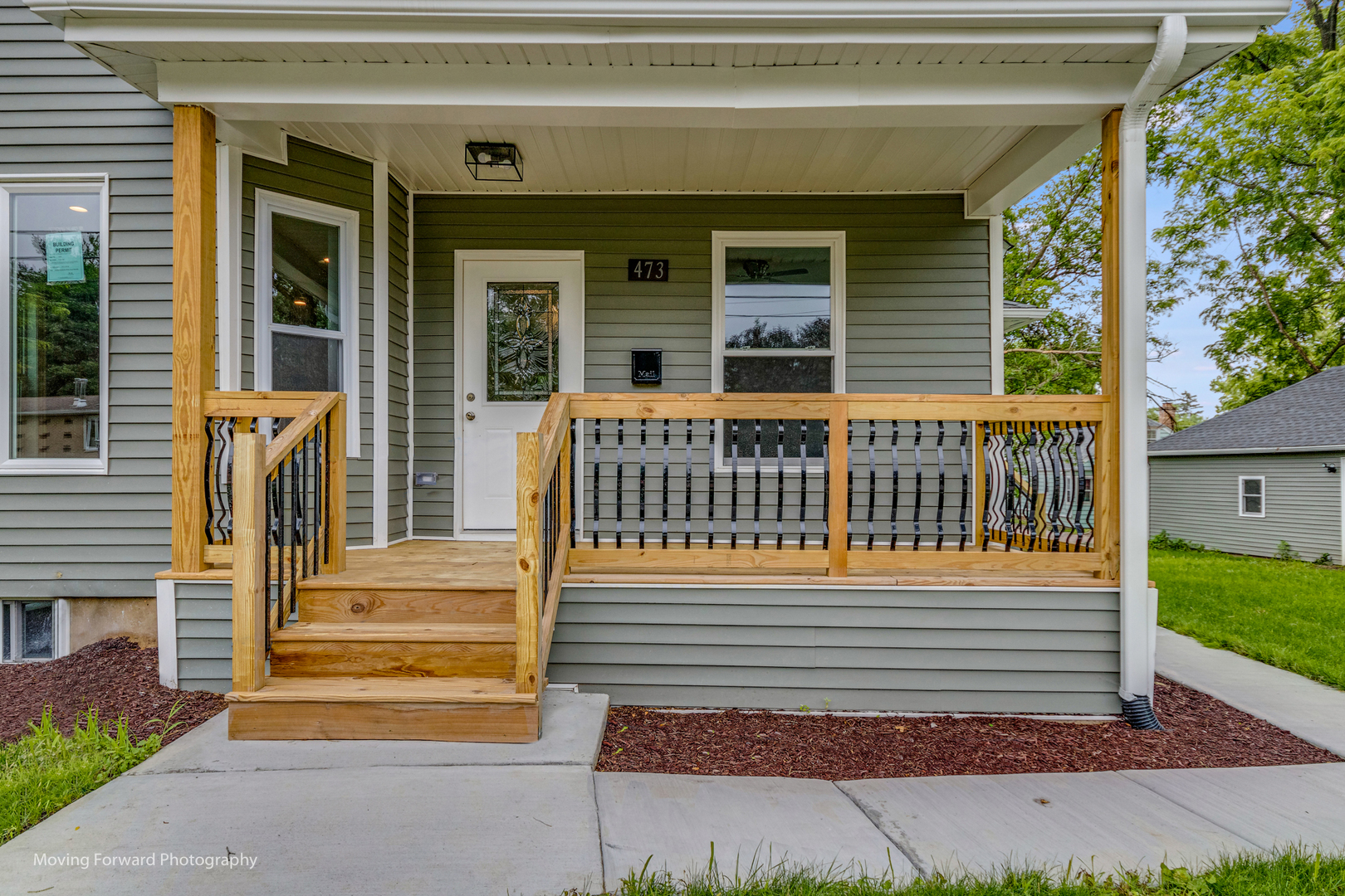 473 East Elm Street Sycamore, IL 60178 - Photo 4 of 53 a view of a house with a small yard and wooden floor and fence