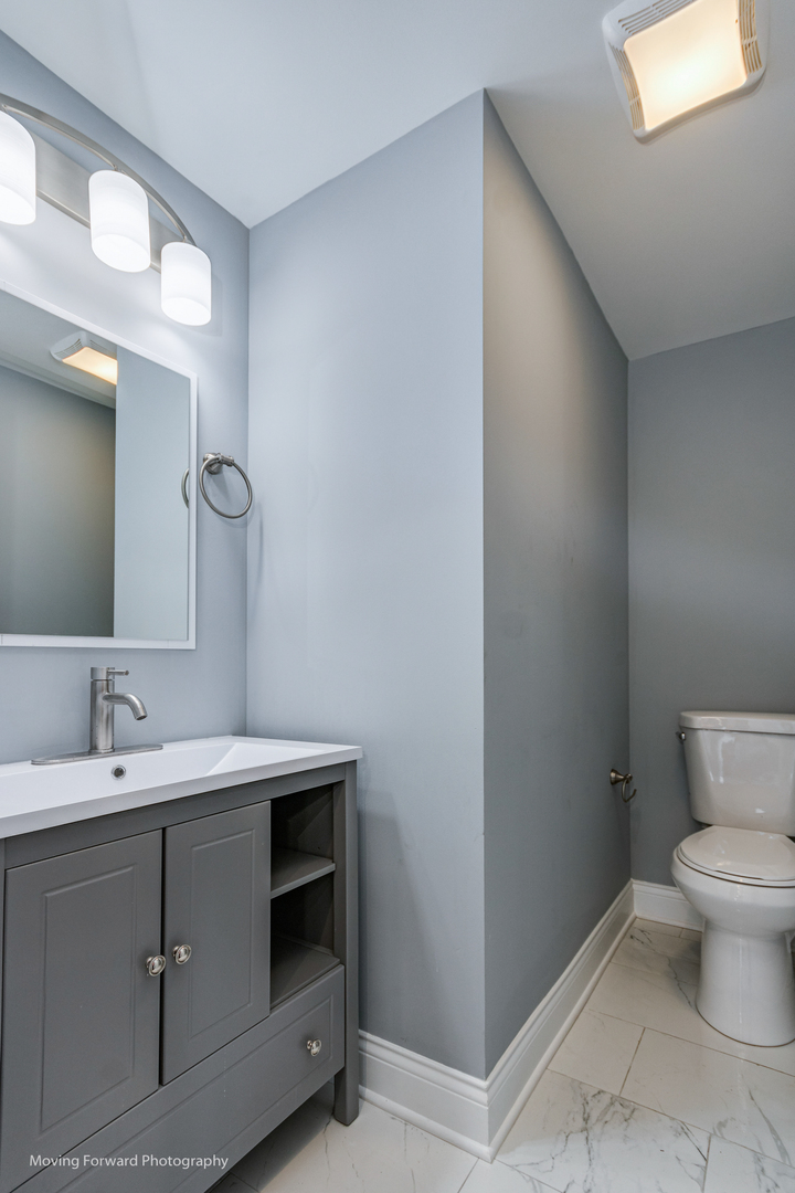 473 East Elm Street Sycamore, IL 60178 - Photo 43 of 53 a bathroom with a sink and a toilet