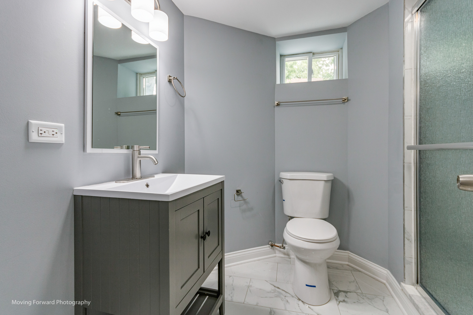 473 East Elm Street Sycamore, IL 60178 - Photo 47 of 53 a bathroom with a toilet sink and mirror