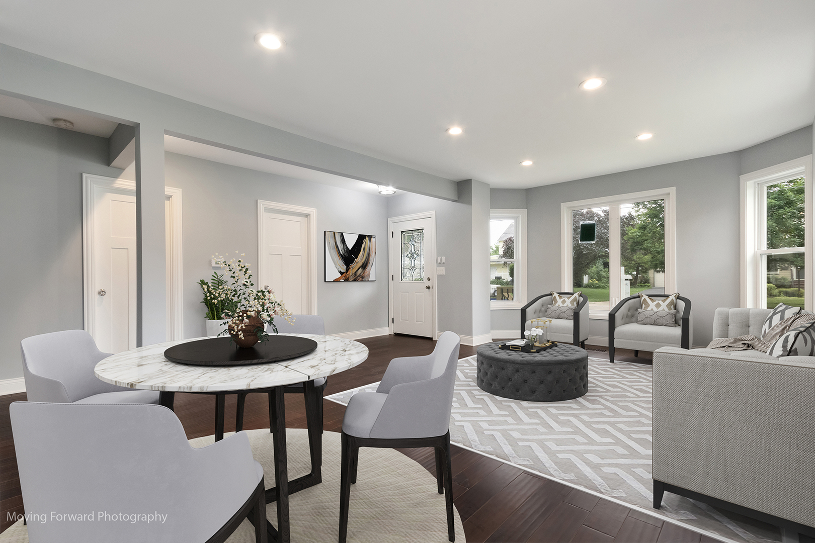 473 East Elm Street Sycamore, IL 60178 - Photo 10 of 53 a living room with furniture potted plant and windows