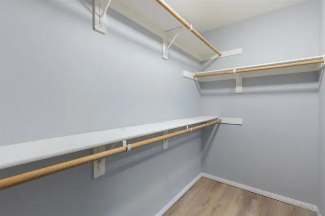 a view of a room with racks on the wall