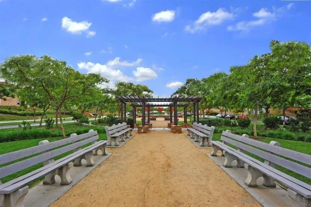 a view of a street with a park