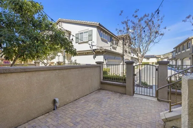 a view of a house with a tree