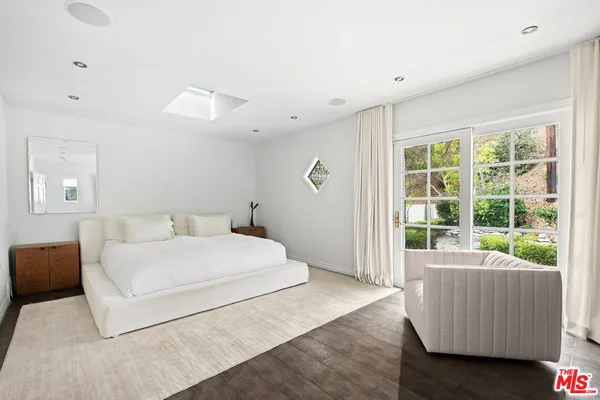 a room with a bed and a couch
