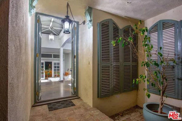 a view of a door and a window