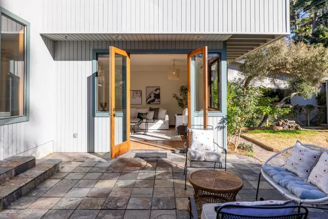 a outdoor space with furniture and a potted plant
