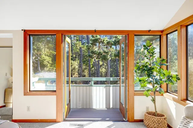 a view of a porch and a yard