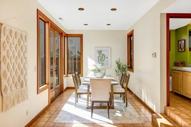 a view of a livingroom with furniture and front door
