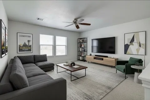 a view of a patio with couches and potted plants