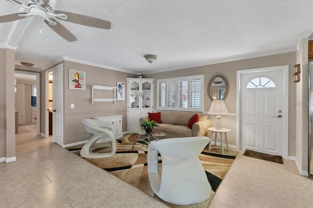 a living room with furniture and a window