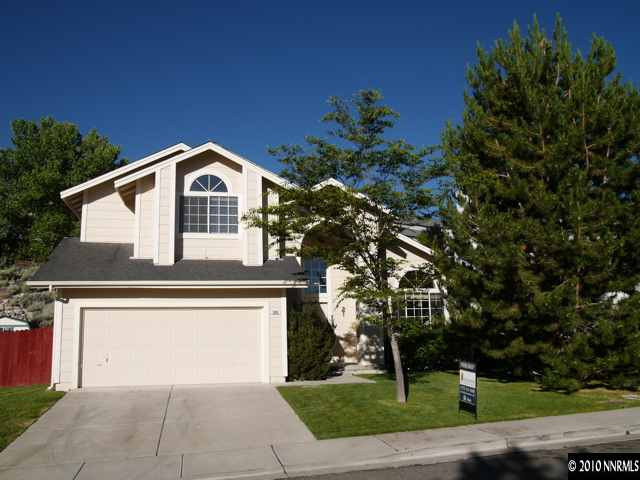 3938 Aspendale Drive Reno, NV 89503 - Photo 1 of 9 a front view of a house with garden
