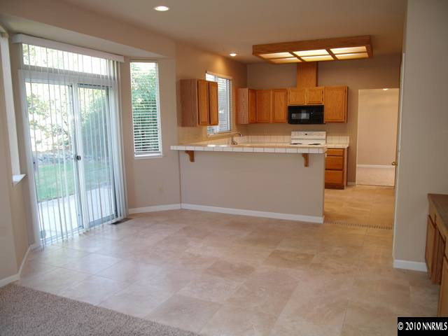 3938 Aspendale Drive Reno, NV 89503 - Photo 5 of 9 a view of kitchen with furniture and stove