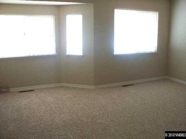 3938 Aspendale Drive Reno, NV 89503 - Photo 7 of 9 a view of an empty room with a window
