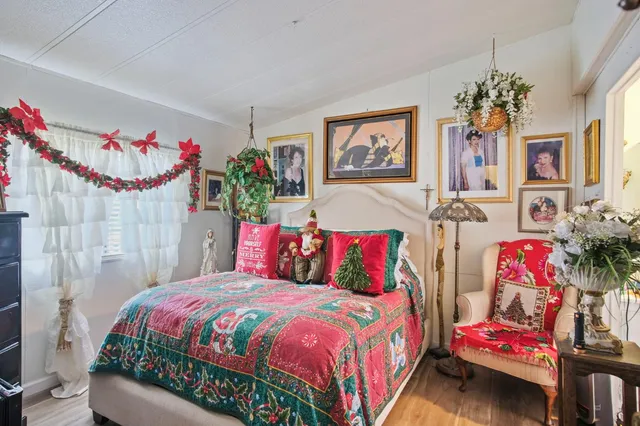 a bathroom with a sink a toilet and shower curtain