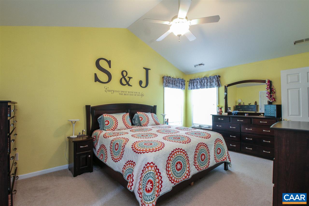 11 Ashton Road Palmyra, VA 22963 - Photo 12 of 30 a bedroom with a bed and a dresser