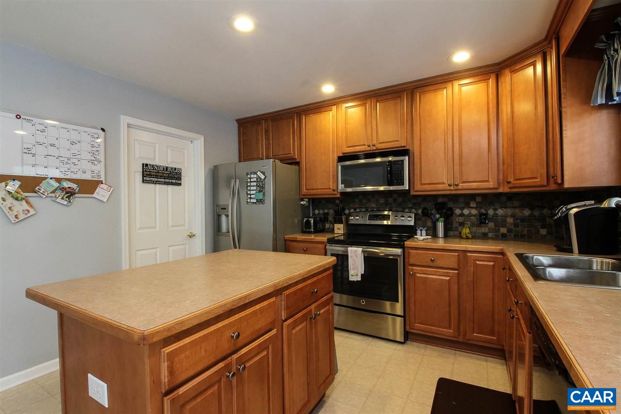 11 Ashton Road Palmyra, VA 22963 - Photo 7 of 30 a kitchen with stainless steel appliances a stove a refrigerator a sink a stove and cabinets