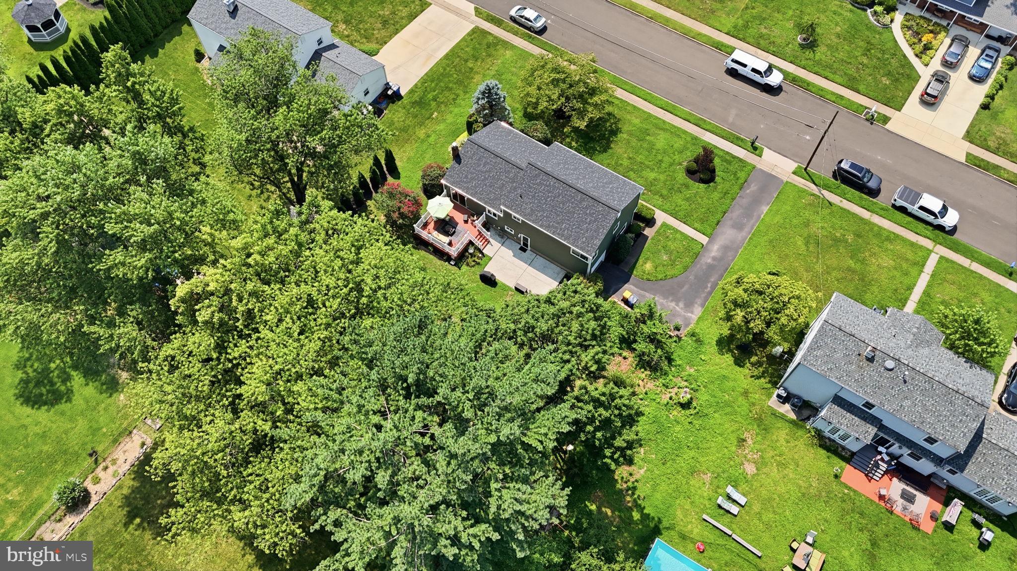 298 Hickory Road Yardley, PA 19067 - Photo 47 of 48 Lush greenery surrounds a charming home.