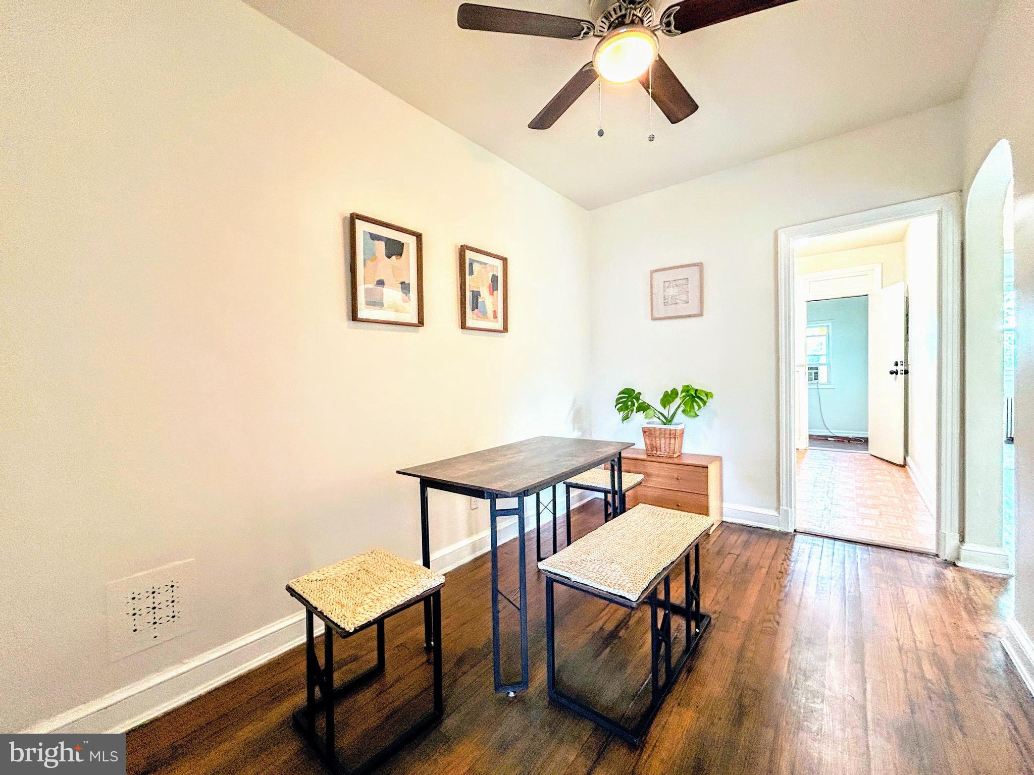 446 Mellon Street Southeast, Unit 4 Washington, DC 20032 - Photo 4 of 16 a view of a livingroom with furniture and wooden floor