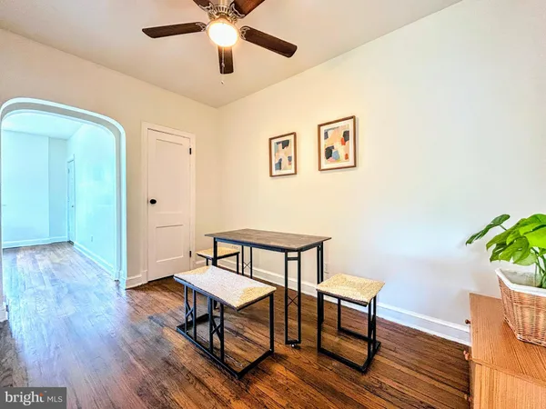 a view of a livingroom with furniture and wooden floor