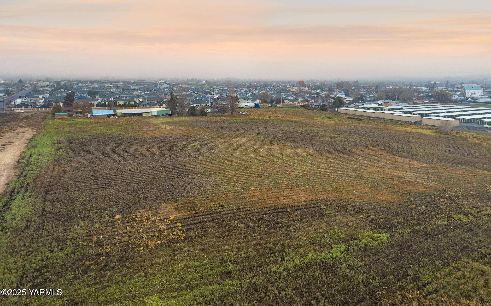 Nka North Rivard Road Moxee, WA 98936 - Photo 9 of 10 a view of an ocean with boats and trees in the background