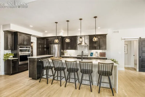 $999,995 | 6411 Tumble Creek Drive, Colorado Springs, CO 80924