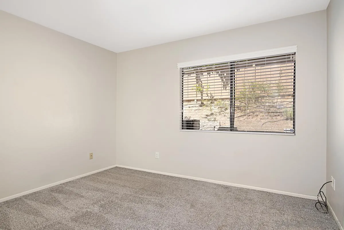 4031 Grayson Drive San Diego, CA 92130 - Photo 18 of 40 an empty room with a window