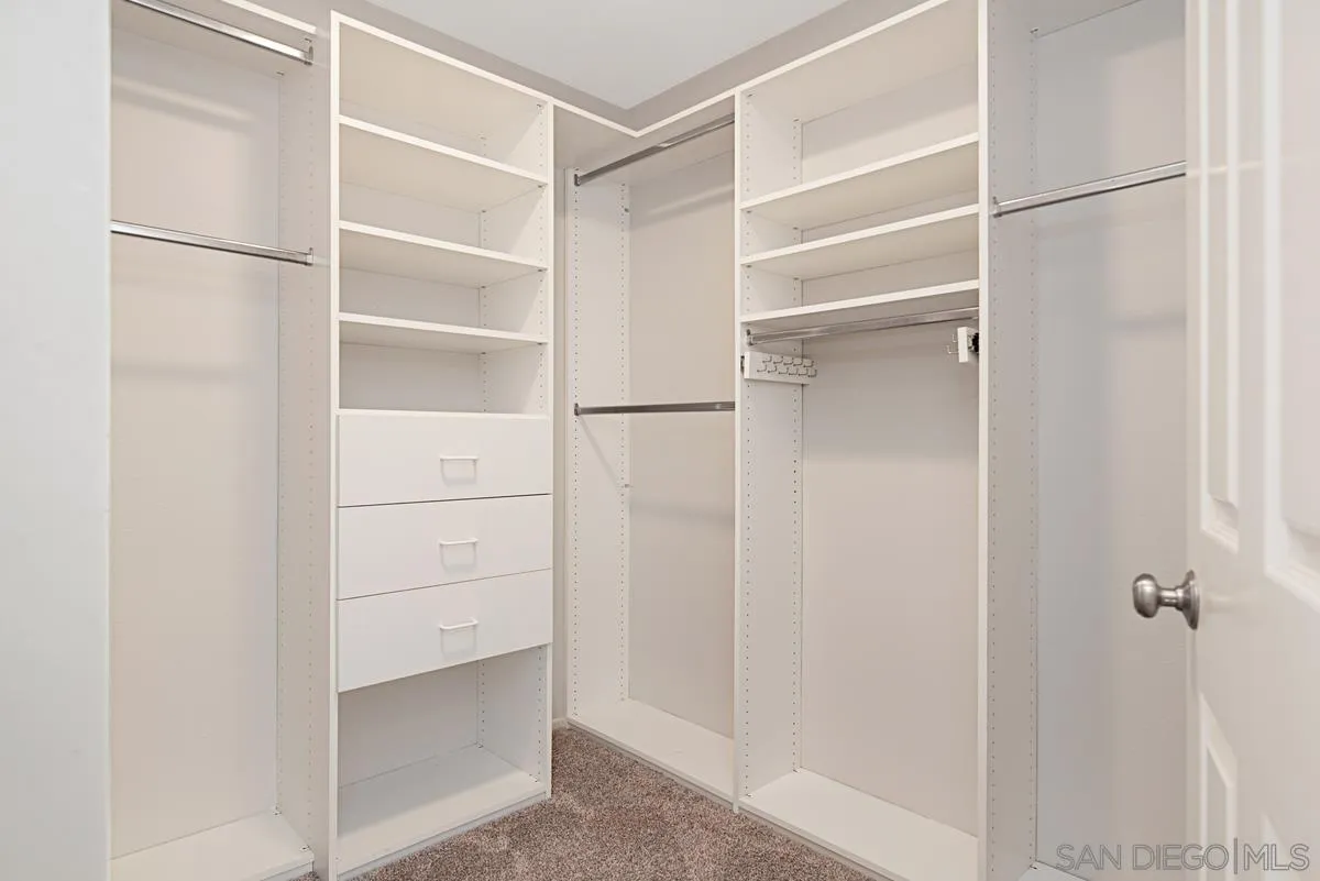 4031 Grayson Drive San Diego, CA 92130 - Photo 30 of 40 a view of walk in closet with empty racks