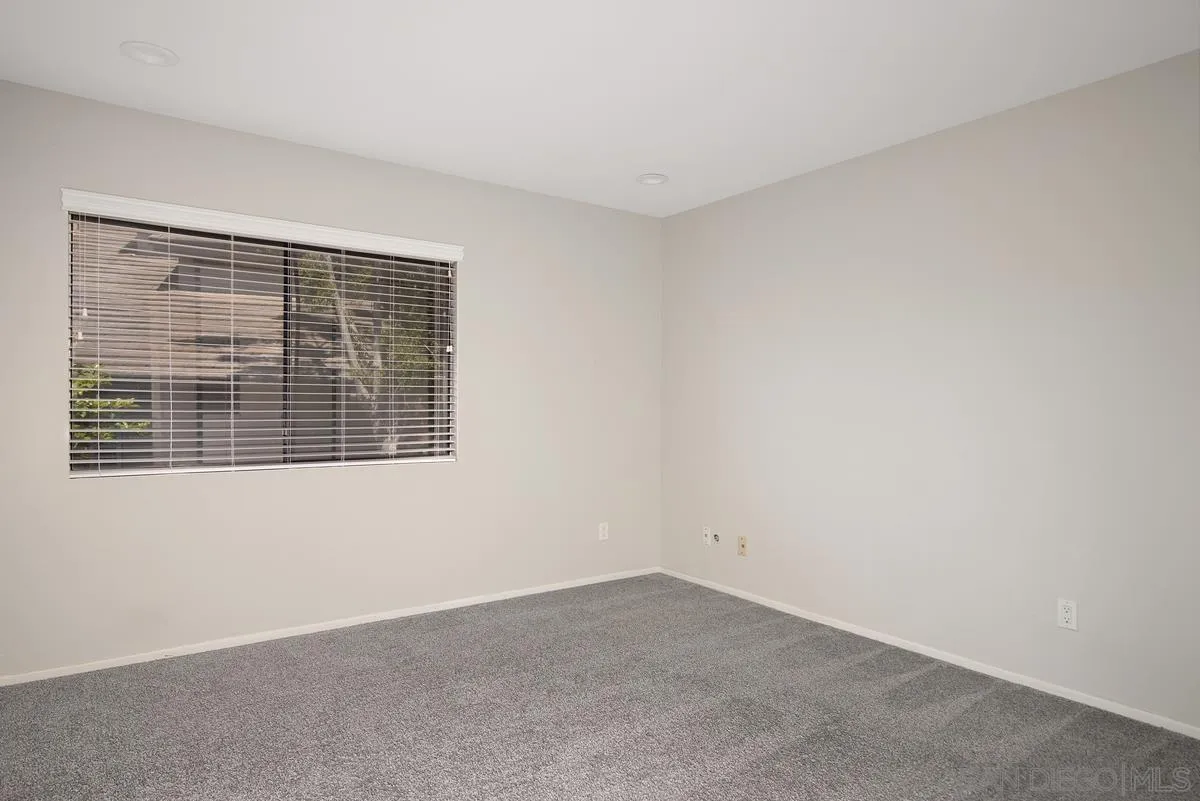 4031 Grayson Drive San Diego, CA 92130 - Photo 33 of 40 a view of an empty room with a window
