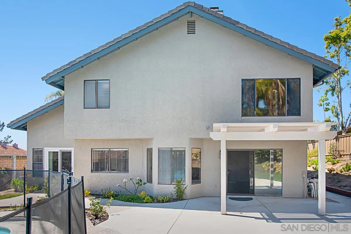 4031 Grayson Drive San Diego, CA 92130 - Photo 39 of 40 a front view of a house with garden