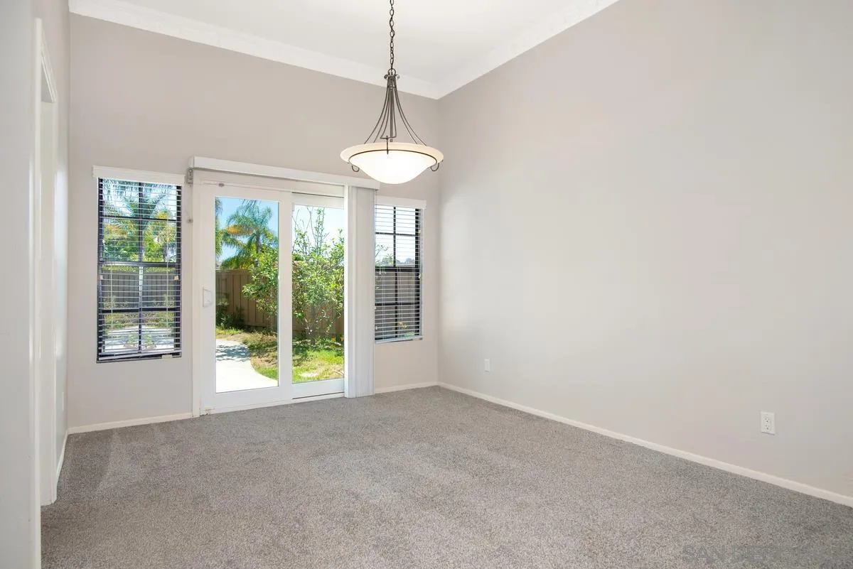 4031 Grayson Drive San Diego, CA 92130 - Photo 8 of 40 a view of an empty room with a window