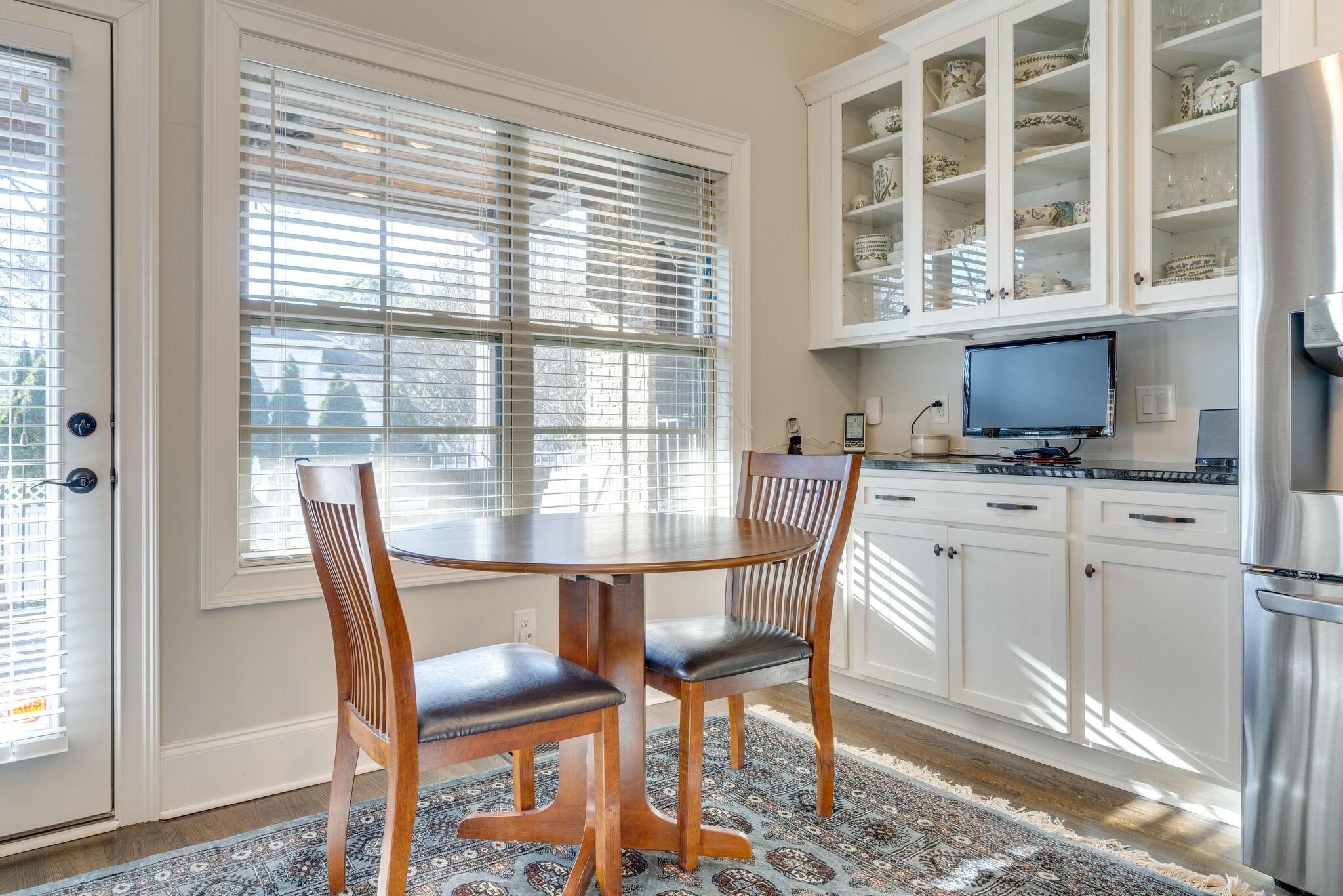 6400 Harding Pike Nashville, TN 37205 - Photo 18 of 38 a view of a dining room with furniture window and outside view