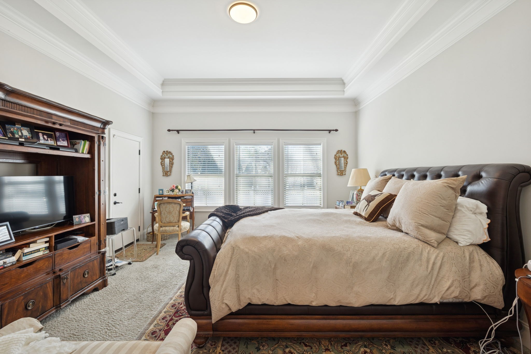 6400 Harding Pike Nashville, TN 37205 - Photo 20 of 38 a bedroom with a bed and a flat screen tv