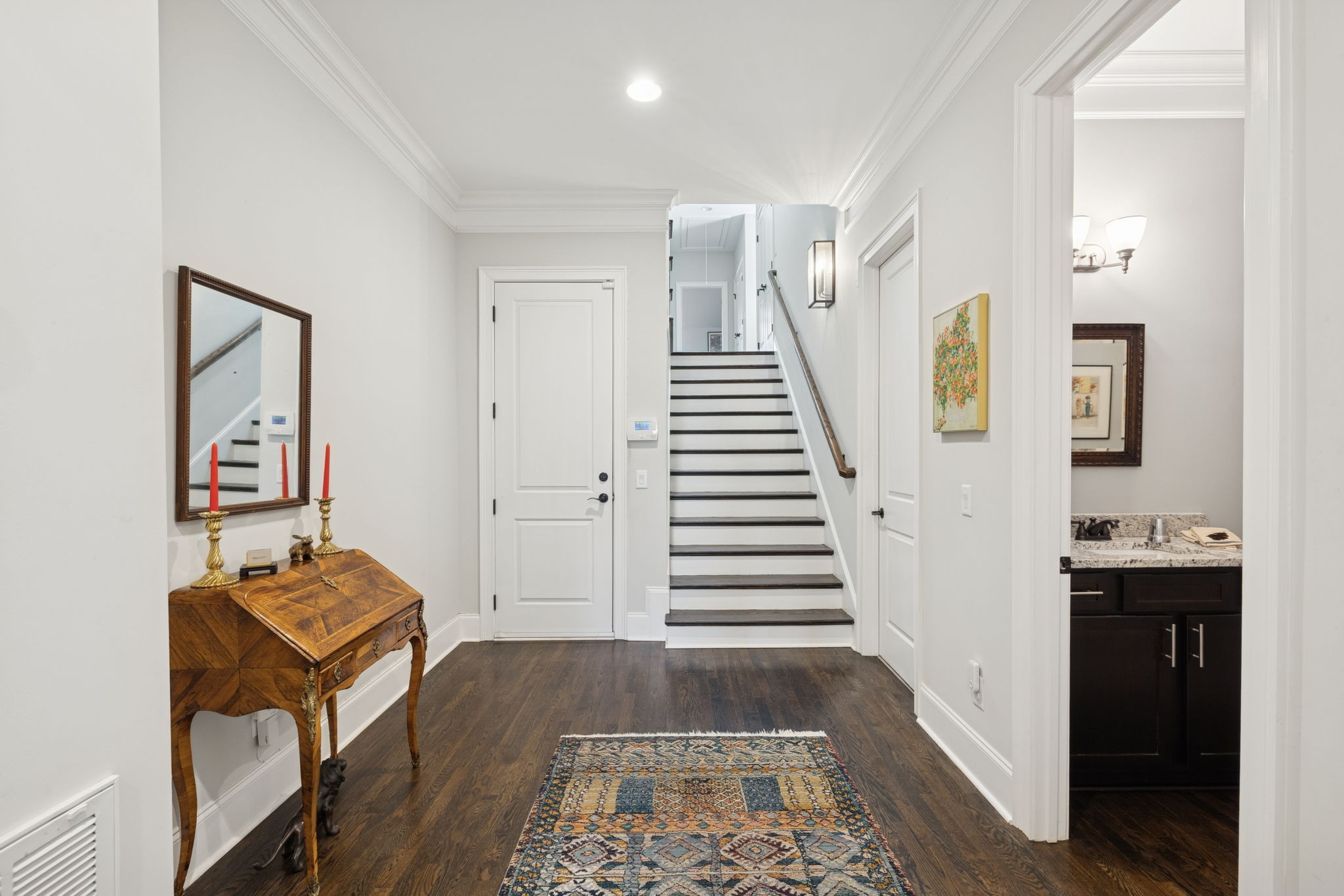 6400 Harding Pike Nashville, TN 37205 - Photo 24 of 38 a view of a hallway to a livingroom with wooden floor and workspace