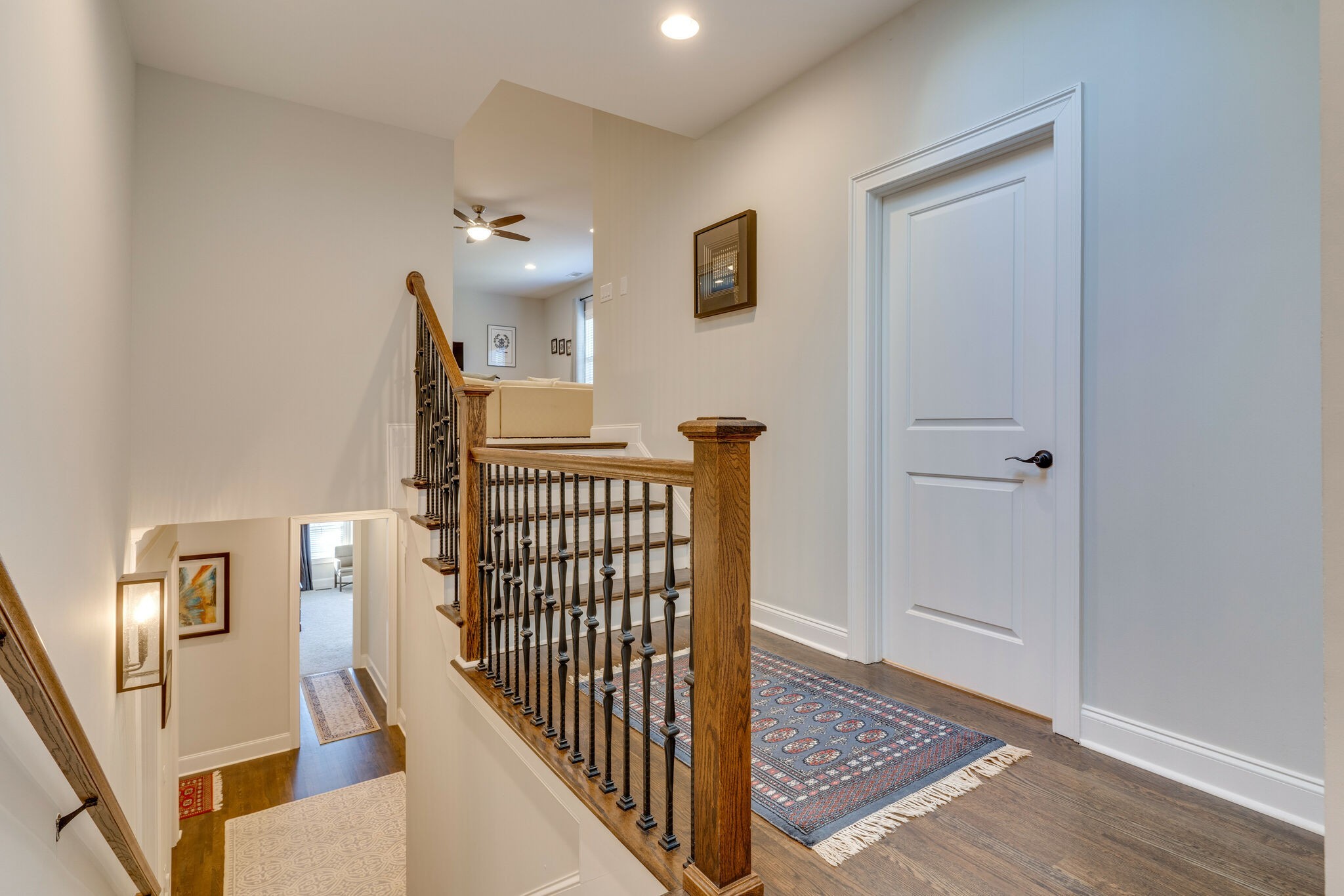 6400 Harding Pike Nashville, TN 37205 - Photo 25 of 38 a view of a hallway with wooden floor and stairs
