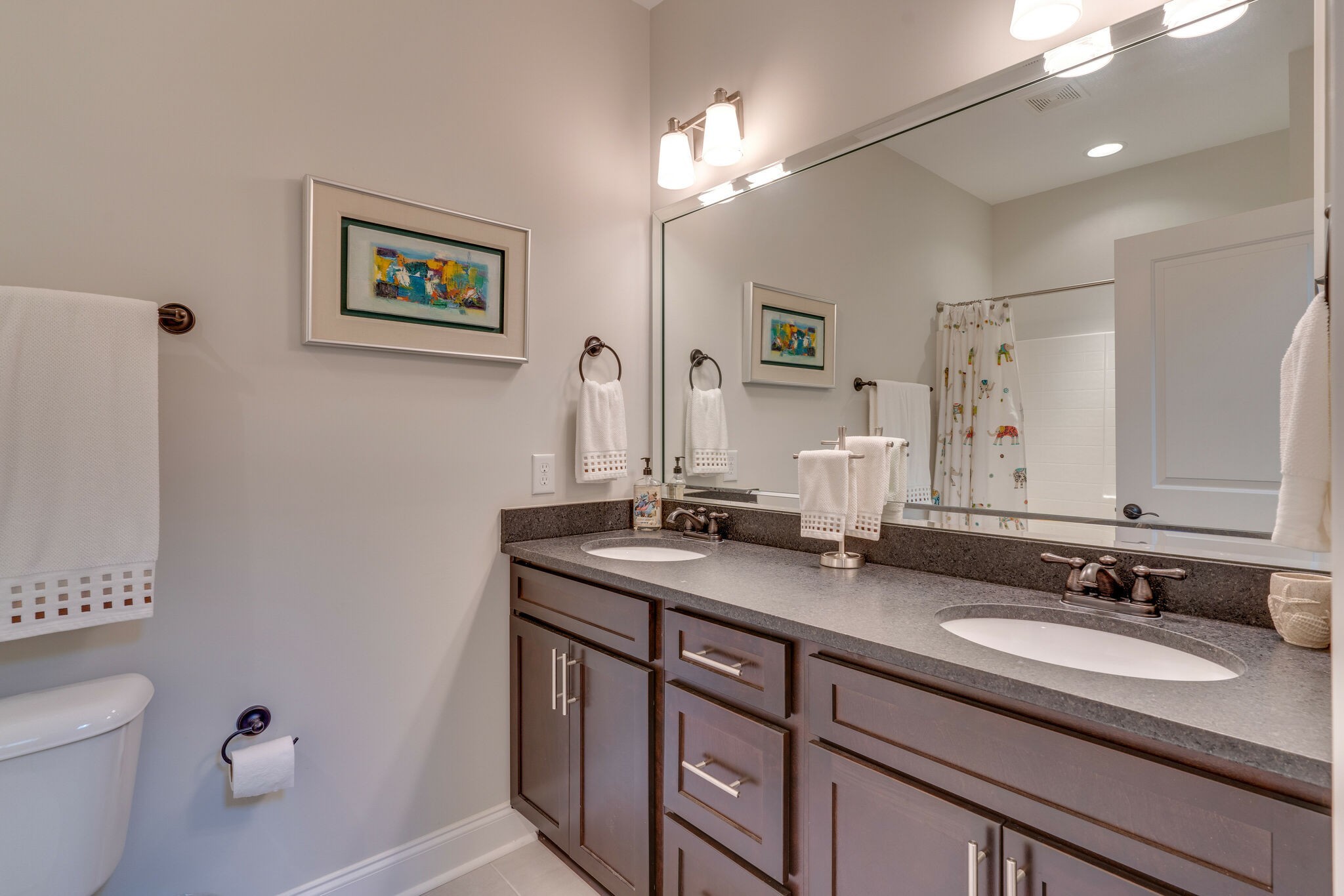 6400 Harding Pike Nashville, TN 37205 - Photo 27 of 38 a bathroom with a granite countertop sink and a mirror with toilet