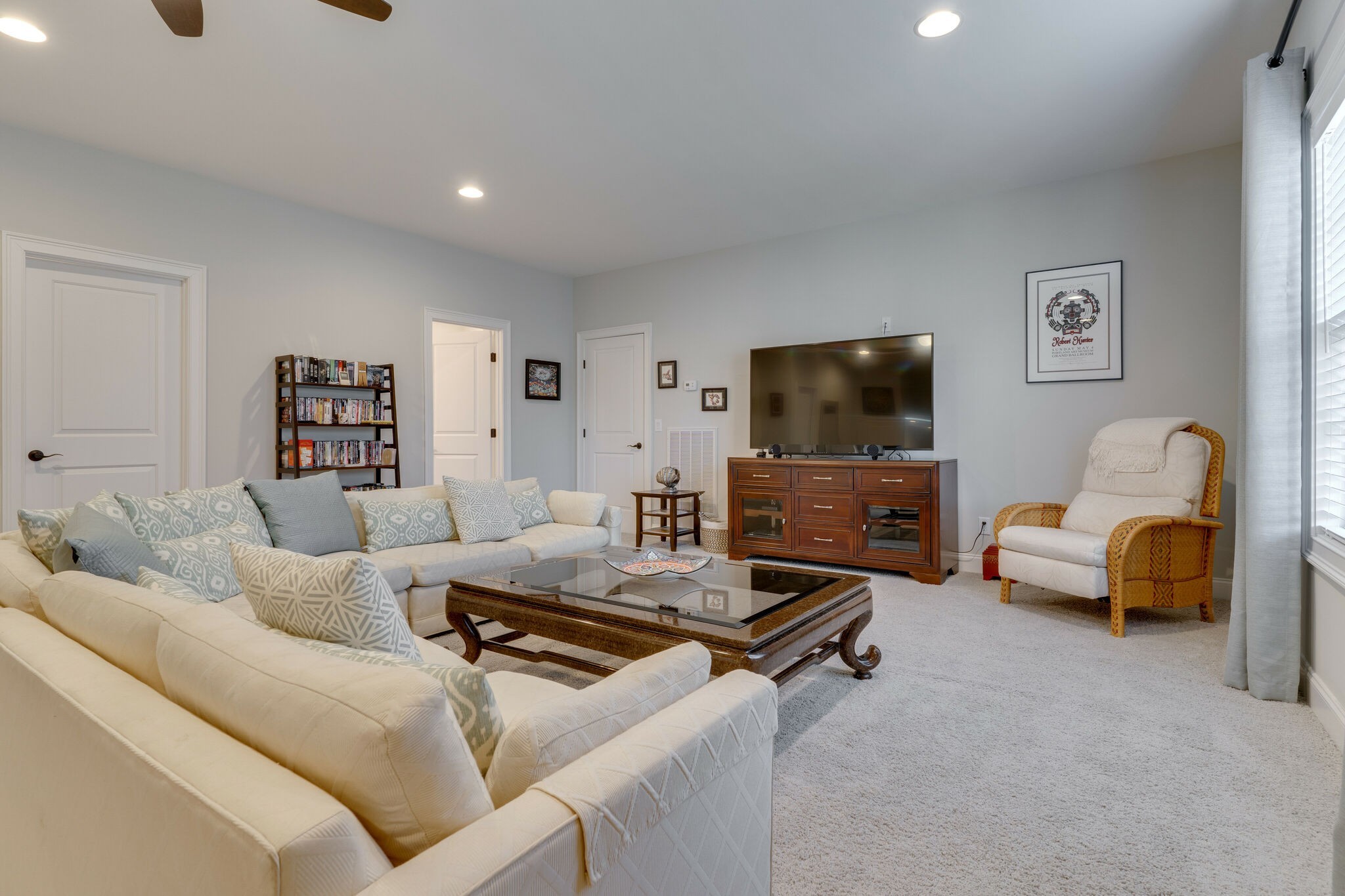 6400 Harding Pike Nashville, TN 37205 - Photo 30 of 38 a living room with furniture and a flat screen tv