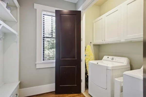a utility room with dryer and washer