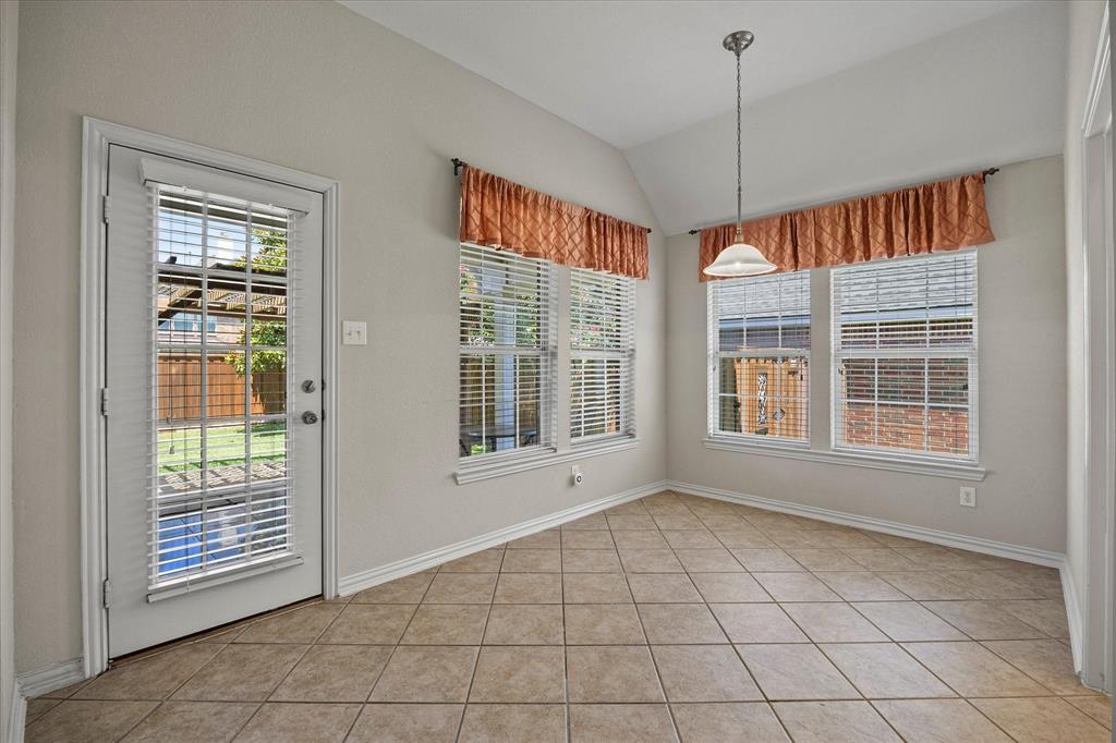 207 Leonard Way Fate, TX 75087 - Photo 18 of 31 a view of an empty room with a window