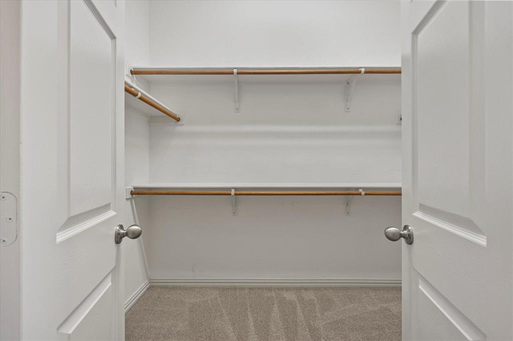 207 Leonard Way Fate, TX 75087 - Photo 7 of 31 a view of walk in closet