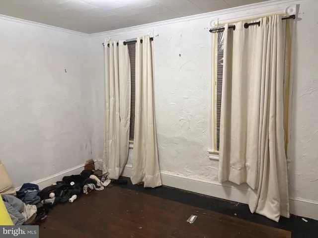 a room with furniture and a window