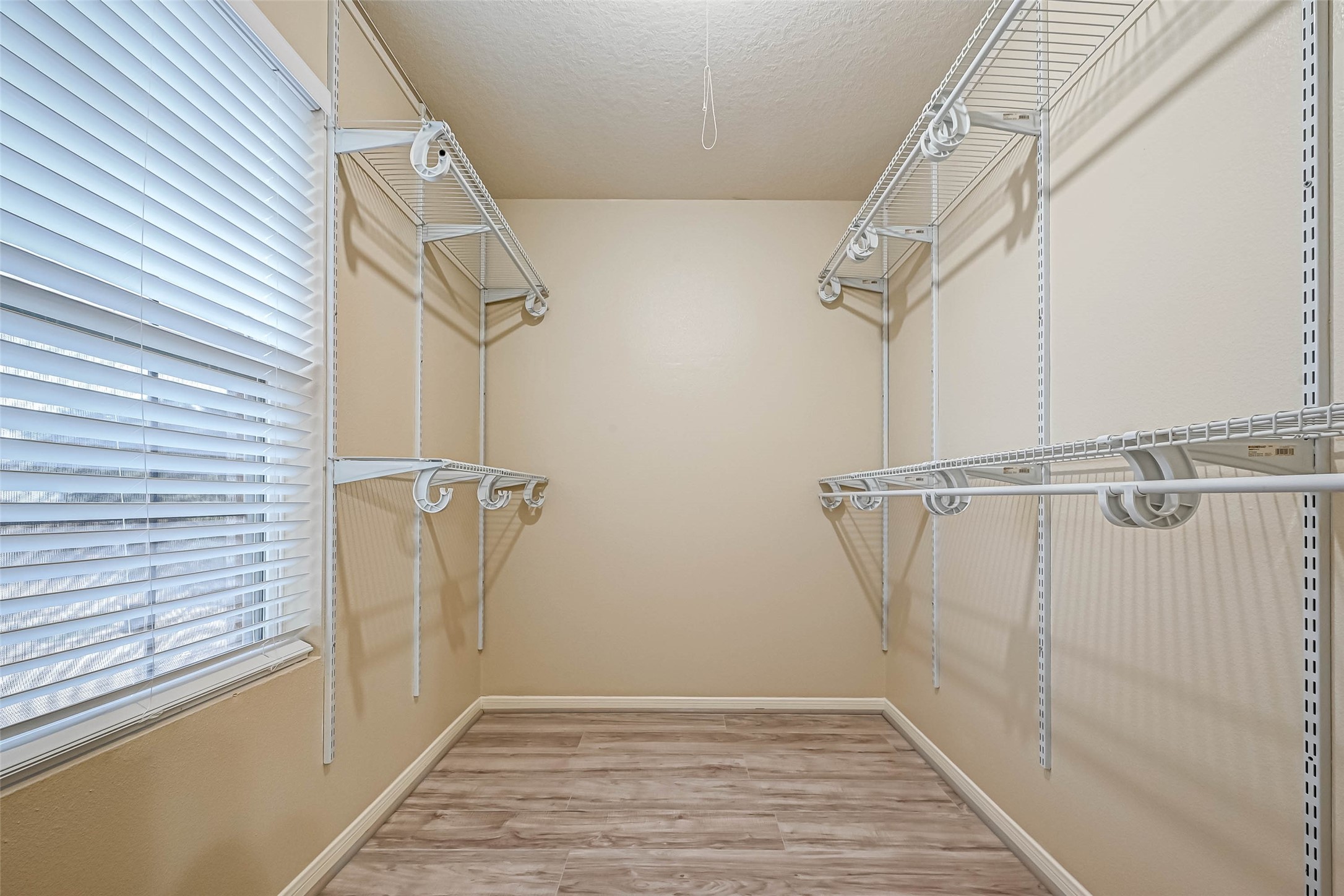 3522 Clipper Winds Way Houston, TX 77084 - Photo 29 of 48 a view of small space with racks on the wall